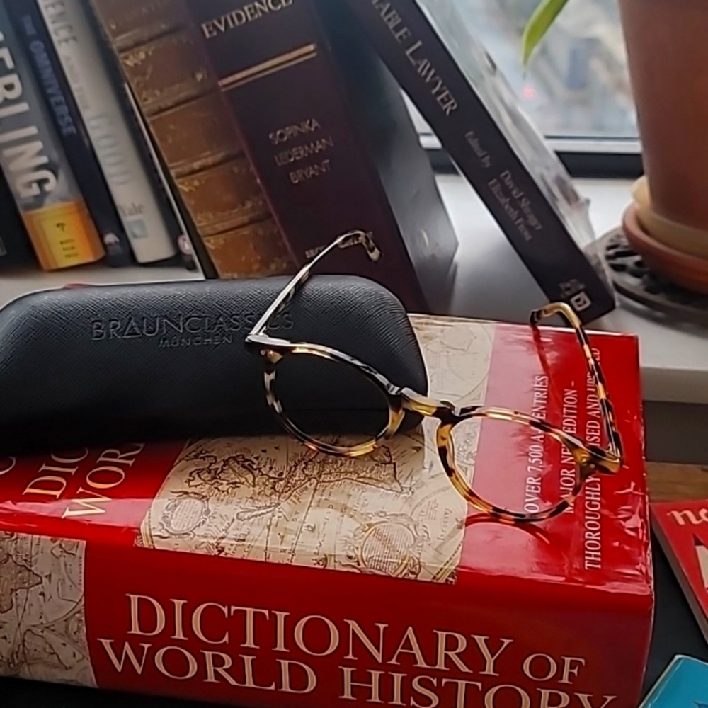 "Gregory Peck" style eyeglass frames. Tortoise shell color.